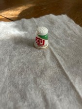 fuji film advertising thimble. Collectible advertising thimble picture