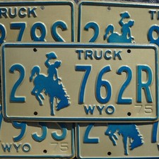 1975 WYOMING LICENSE PLATES - TRUCK BLUE COWBOY HORSE EMBOSSED License Plate Tag picture