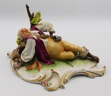 Vintage Antique Capodimonte Porcelain Laughing Drunk Man Figurine Lying on Grass picture