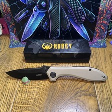 Kubey Ruckus KU314K.  AUS-10 3.5” Blade. G10. Front Flip. Thumb Stud. Liner Lock picture