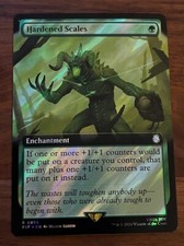 1x SURGE FOIL BORDERLESS HARDENED SCALES - FALLOUT - MTG - Magic the Gathering picture