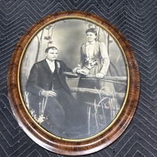 Antique Wedding Portrait in Oval Wood Frame picture