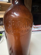 Vintage A. Mattei Fresno CA Amber Glass 1/2 Gallon Embossed Bottle picture