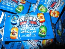 50 X  2014 TOPPS SKYLANDERS TRAP TEAM DOG TAGS MEDAILLES picture
