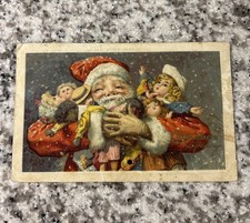 Antique 1913 Santa Claus Holding 7 Dolls postcard Rare Damaged As Is Posted 1927 picture