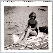 Vtg B&W Snapshot Pretty Smiling Woman Swimsuit Beach Blanket July 1952 picture
