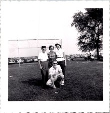 Smiling Young Friends on Grassy Field, 1950s B&W Snapshot Photo picture
