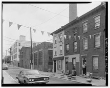 Photo:Collom Street Easton PA 1960s streetscape brick rowhouses cars picture