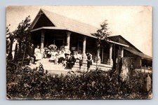 RPPC Families Outside of Lodge or Large Home Postcard picture