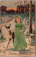 c1910s CHRISTMAS Postcard Angel Girl in Green Dress with Deer in the Woods picture