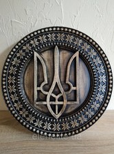 Panel with the Coat of Arms of Ukraine. Trident with national symbols: Cossack picture