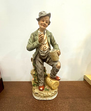 Vintage Ceramic Hand Painted Matte Figurine Seated Man with Mug picture