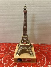 Vintage Eiffel Tower Figurine: Paris Souvenir on Base. picture