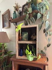 Antique Wooden Crate Repurposed As A Display Shelf picture